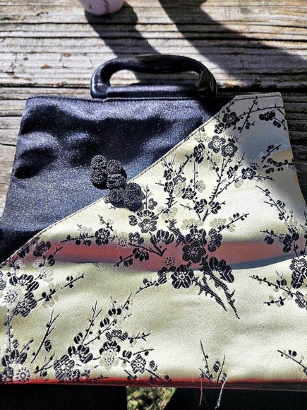 Asian-style Evening bag featuring a Satin or Brocade Floral pattern